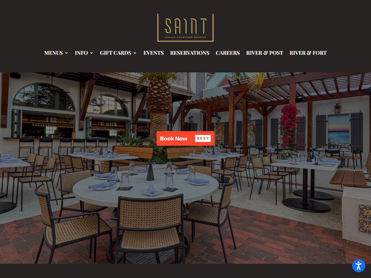 Preview of Saint's official website showing its courtyard beneath the restaurant's logo and menu